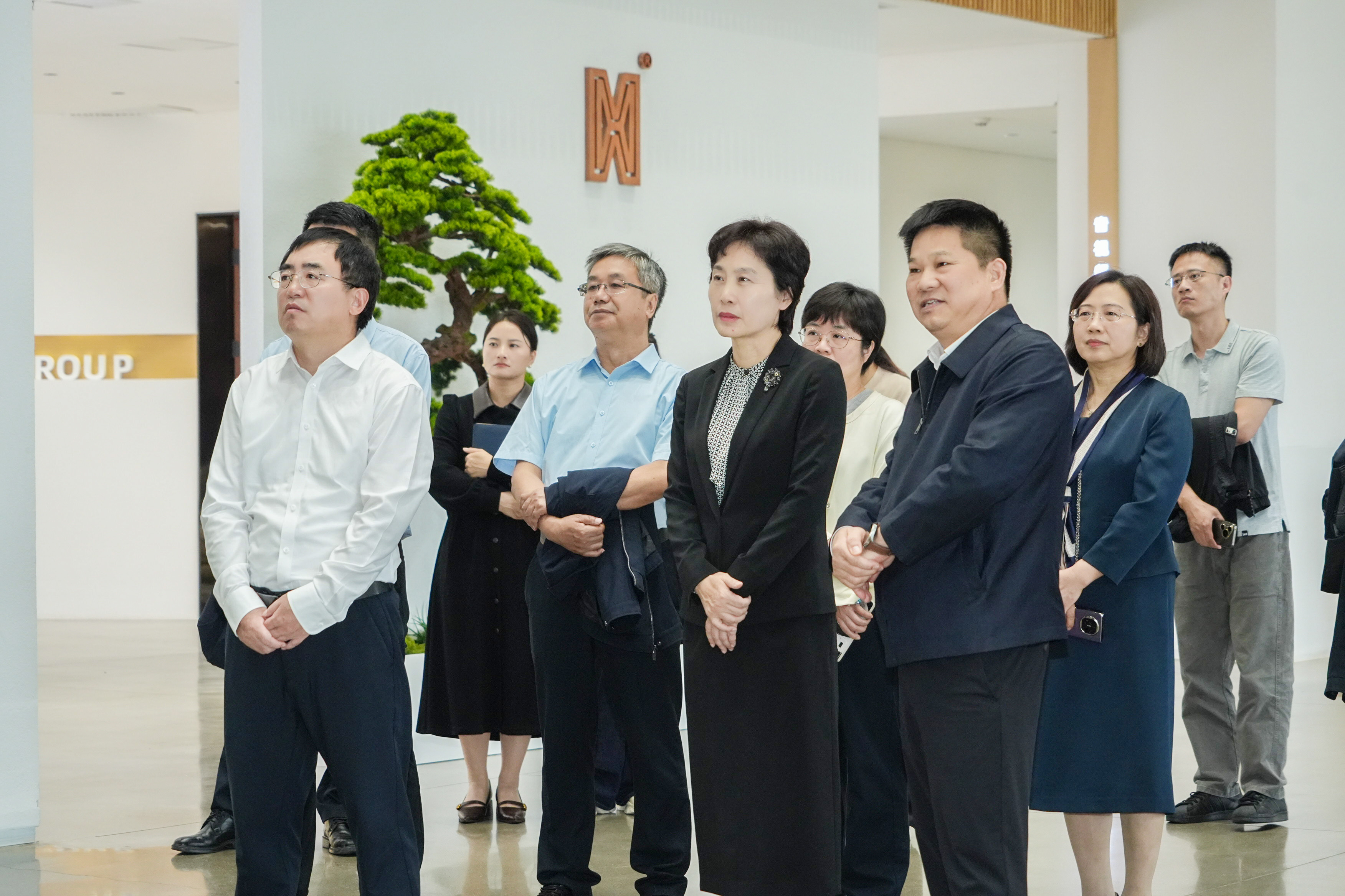 文化和旅游部党组成员、副部长王建华一行莅临明和调研指导